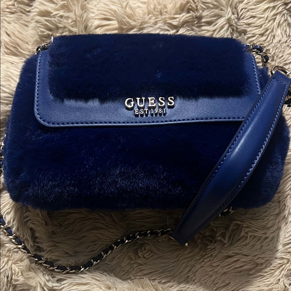 GUESS Royal Blue Faux Fur Crossbody Bag with Gold Chain Accent and Charms